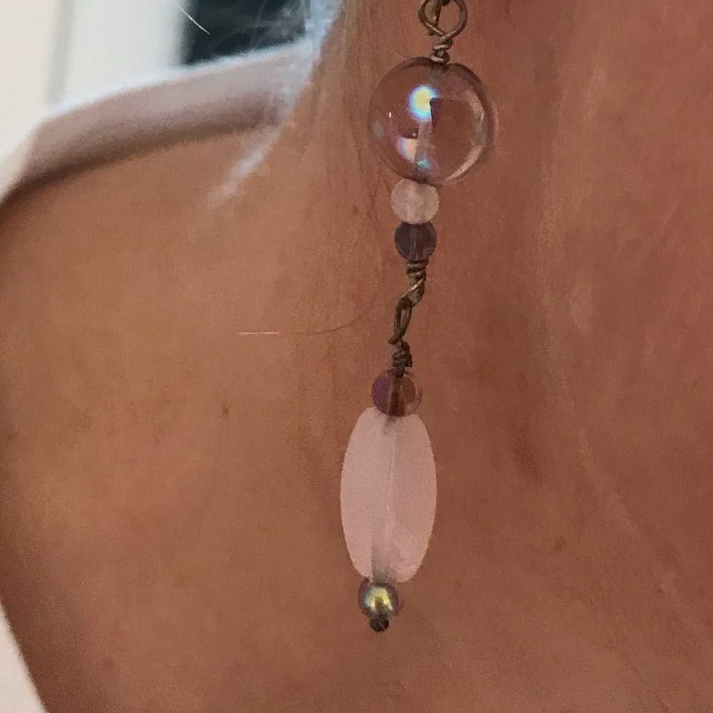 Silver earrings with pink stones and purple accent